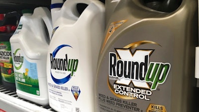 In this Feb. 24, 2019, file photo, containers of Roundup are displayed on a store shelf in San Francisco. The Environmental Protection Agency is reaffirming that a popular weed killer is safe for users, even as legal claims mount from people who blame the herbicide for their cancer. The EPA’s draft findings Tuesday, April 30, come after two recent multimillion-dollar U.S. court judgments against the herbicide.