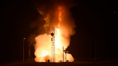This photo provided by Vandenberg Air Force Base shows an unarmed Minuteman III intercontinental ballistic missile launching during an operational test on Wednesday, May 1, 2019, at Vandenberg Air Force Base, Calif. A fiery streak lit up the California sky as the U.S. Air Force conducted an early morning test of an unarmed Minuteman 3 intercontinental ballistic missile.
