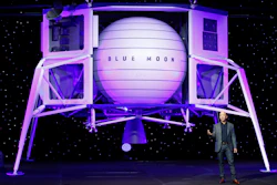 Jeff Bezos speaks in front of a model of Blue Origin's Blue Moon lunar lander, Thursday, May 9, 2019, in Washington.