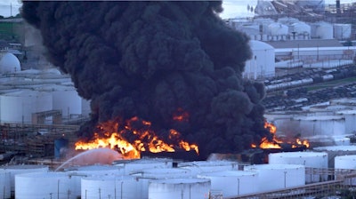 Firefighters battle a petrochemical fire at the Intercontinental Terminals Company Monday, March 18, 2019, in Deer Park, Texas.