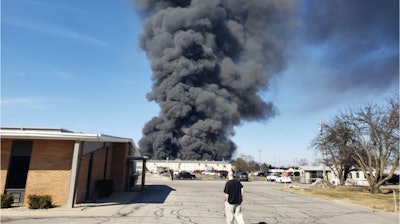 Smoke rises during the March 12 fire at the Forest River RV plant.