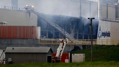 Firefighters battle a large fire at the Georgia-Pacific paper plant east of Muskogee on Tuesday, May 14, 2019. Muskogee County officials say an explosion and fire were reported late Monday night at the Georgia-Pacific plant in Muskogee.