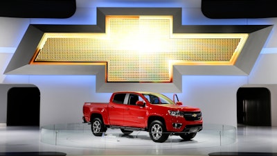 In this Nov. 21, 2013, file photo the new 2015 Chevrolet Colorado pickup truck is on display at the Los Angeles Auto Show in Los Angeles. U.S. highway safety regulators are investigating whether General Motors went far enough when it recalled about 3,000 small pickup trucks in 2016. The National Highway Traffic Safety Administration is looking into whether GM should recall about 115,000 Chevrolet Colorado and GMC Canyon pickups from the 2015 model year. The agency says it has received 50 complaints about failures from owners of trucks that weren’t included in the 2016 recall.