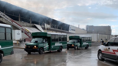 Muskogee Public Schools helps transport firefighters and Georgia-Pacific employees following an overnight fire.