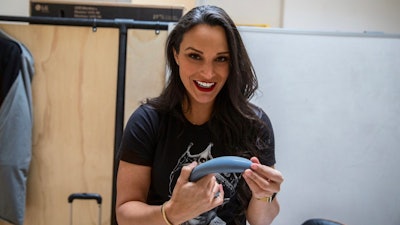 Lora Haddock, Founder and CEO of Lora DiCarlo, holding the Osé, which could disrupt the traditionally male-dominated industry.