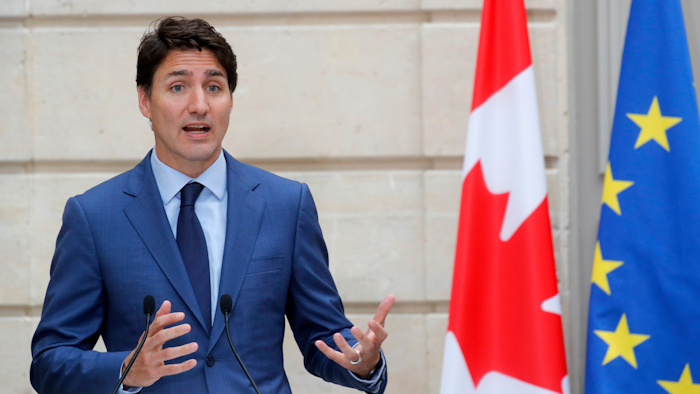 Canadian Prime Minister Justin Trudeau speaks during a joint press conference with French President Emmanuel Macron at the Elysee Palace in Paris, France.