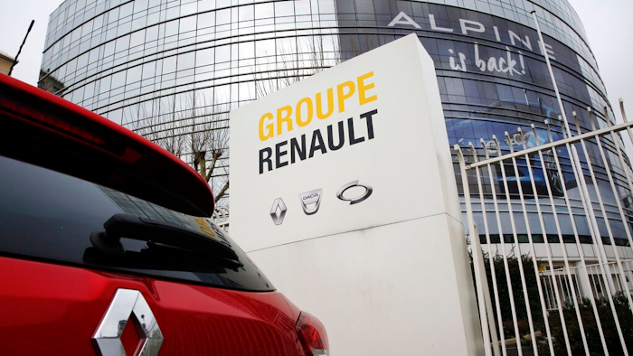 This photo taken on Thursday, Jan. 24, 2019 show a Ranult car parking outside the French carmaker headquarters in Boulogne-Billancourt, outside Paris, France. French carmaker Renault looks set to give its approval to Fiat Chrysler's merger offer. The company's board is meeting Tuesday afternoon at its headquarters to decide on a deal that could reshape the global auto industry.