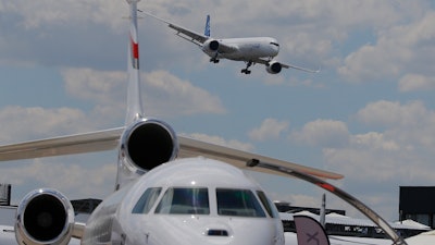 An Airbus A 350 - 1000 performs a demonstration flight at Paris Air Show, in Le Bourget, east of Paris, France.