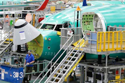 In this March 27, 2019, file photo, a Boeing 737 MAX 8 airplane is shown on the assembly line during a brief media tour of Boeing's 737 assembly facility in Renton, Wash. With the 737 Max jet still grounded after two deadly crashes, deliveries of new Boeing jets are falling far behind last year's pace. Boeing said Tuesday, June 11, 2019, that it delivered 30 commercial airliners during May, down 56% from the 68 it made in May 2018.