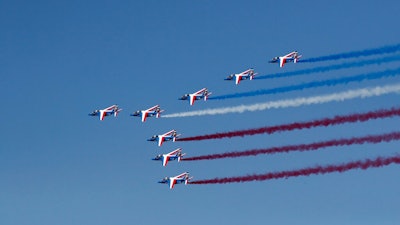 Alpha jets from the French Air Force Patrouille de France fly during the inauguration the 53rd International Paris Air Show at Le Bourget Airport near Paris, France, Monday June 17, 2019. The world's aviation elite are gathering at the Paris Air Show with safety concerns on many minds after two crashes of the popular Boeing 737 Max.