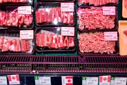 Packs of Canadian pork are displayed for sale at a supermarket in Beijing, Tuesday, June 18, 2019. China will halt imports from a Canadian company after food safety issues were detected in one batch of pork, the Xinhua state news agency reported Tuesday, a move likely to fuel further speculation that China is retaliating against Canada after it arrested a Chinese tech executive.