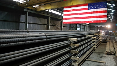 In this May 9, 2019, photo, steel rods produced at the Gerdau Ameristeel mill in St. Paul, Minnesota await shipment.