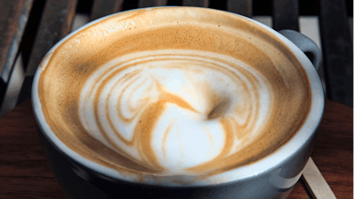 This file photo shows steamed milk floating atop a cup of coffee at a cafe in Los Angeles. California has officially concluded coffee does not pose a 'significant' cancer risk.