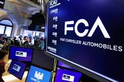 In this May 28, 2019, file photo, the Fiat Chrysler Automobiles logo appears above a post on the floor of the New York Stock Exchange. Japanese automaker Nissan wasn’t consulted about a proposed merger between its French alliance partner Renault and Fiat Chrysler and has little say over the issue. Partnering with a colossal Renault-Fiat Chrysler could help Nissan slash costs on shared components and research.
