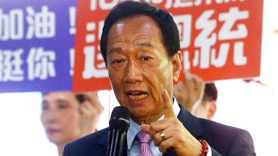 Terry Gou, chairman of Foxconn, the world’s largest contract assembler of consumer electronics, speaks to the media after the company's annual shareholders meeting in New Taipei City, Taiwan, Friday, June 21, 2019. Gou said he is stepping down amid speculation he could be planning a presidential run next year.