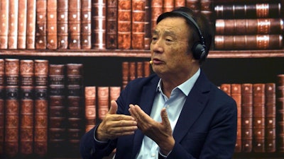 Huawei founder Ren Zhengfei speaks at a roundtable at the telecom giant's headquarters in Shenzhen in southern China.