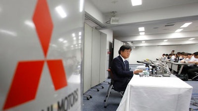 Japan Mileage Scandal Mitsubishi Ap
