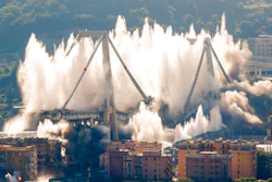 A cloud of dust rises as the remaining spans of the Morandi bridge are demolished in a planned expolosion, in Genoa, Italy, Friday, June 28, 2019. The spectacular planned explosion knocked down the remaining spans and supporting columns of the Italian bridge that collapsed last year, killing 43 people and some 3,500 people who live nearby had been evacuated as a precaution in the last hours; sirens sounded a final warning.