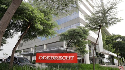 This April 12, 2018 file photo shows the Odebrecht headquarters in Sao Paulo, Brazil. The Brazilian construction giant filed for bankruptcy protection to restructure $13 billion in debt on Monday, June 17, 2019, worn down after spending five years at the center of one of the world’s largest corruption investigations.