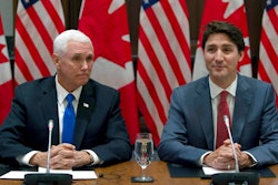 Canadian Prime Minister Justin Trudeau, right, and U.S. Vice President Mike Pence wait for the Canadian Council for the United States–Mexico–Canada Agreement meeting to begin on Parliament Hill in Ottawa, Ontario, Thursday, May 30, 2019.