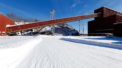 This Feb. 10, 2016, file photo, shows a former iron ore processing plant near Hoyt Lakes, Minn., that would become part of a proposed PolyMet copper-nickel mine. Environmental Protection Agency documents show that its staffers were critical of how Minnesota regulators drafted a key permit for the planned PolyMet copper-nickel mine. And they show the EPA officials concluded the permit would violate federal law because it lacked specific water pollution limits. The EPA released the documents after a court challenge by WaterLegacy. Environmental attorney Paula Maccabee says the EPA's concerns weren't reflected in PolyMet's final water pollution permit.