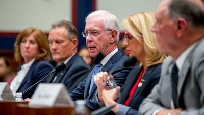 Captain Chesley 'Sully' Sullenberger, accompanied by from left, Sharon Pinkerton with Airlines for America, Captain Dan Carey with the Allied Pilots Association, Sara Nelson with the Association of Flight Attendants-CWA, and former Federal Aviation Administration Administrator Randy Babbitt, speaks during a House Committee on Transportation and Infrastructure hearing on the status of the Boeing 737 MAX on Capitol Hill in Washington, Wednesday, June 19, 2019.