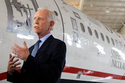In this June 11, 2011, file photo, former Capt. Chesley 'Sully' Sullenberger talks to the media in front of the US Airways flight 1549 aircraft at the Carolina Aviation Museum in Charlotte, N.C. The president of the pilots' union at American Airlines says Boeing made mistakes in its design of the 737 Max and not telling pilots about new flight-control software on the plane. Sullenberger, the captain who safely landed a disabled jetliner on the Hudson River in 2009, is also expected to testify. He has said that Boeing was more focused on protecting its product, the Max, than protecting the people who use it.