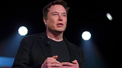 In this March 14, 2019 file photo, Tesla CEO Elon Musk speaks before unveiling the Model Y at the company's design studio in Hawthorne, Calif. Musk will face the electric car maker's shareholders during the company's annual meeting on Tuesday, June 11.