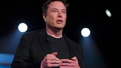 In this March 14, 2019 file photo, Tesla CEO Elon Musk speaks before unveiling the Model Y at the company's design studio in Hawthorne, Calif. Musk says he’s deleted his Twitter account 10 months after a tweet landed him in trouble with U.S. regulators. Musk changed his Twitter display name to Daddy DotCom on Father’s Day. Daddy.com is an actual website that provides parenting information to new and expecting fathers.