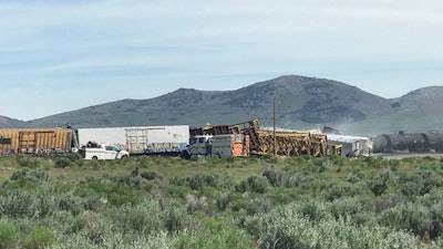 A train carrying military munitions derailed in the high desert of northeast Nevada on Wednesday, closing an interstate for about an hour before emergency crews determined there was no danger.