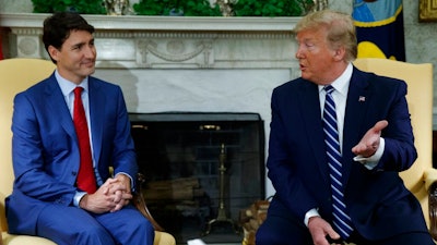 President Donald Trump meets with Canadian Prime Minister Justin Trudeau in the Oval Office of the White House, Thursday, June 20, 2019, in Washington.