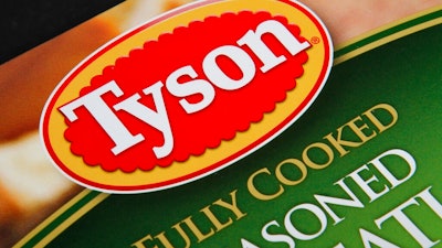 This Nov. 18, 2011, file photo, shows a Tyson food product, in Montpelier, Vt. The Department of Justice tipped its hand last week when it requested a temporary halt to discovery proceedings in a 2016 class-action lawsuit filed by food distributor Maplevale Farms. Maplevale accuses Tyson Foods Inc., Perdue Farms Inc. and others of conspiring to fix poultry prices between 2008 and 2016.