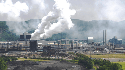 This file photo from July 14, 2010 shows smoke pouring from the United States Steel Corp.'s Clairton Coke Works in Clairton, Pa. A fire at U.S. Steel's massive coke plant outside Pittsburgh knocked a key pollution control system offline Monday, June 17, 2019. It triggered a health warning as officials monitored the air around the plant for signs of a release of toxic sulfur dioxide. It was the second fire since December at the coke works, the largest facility of its kind in the United States. The plant turns coal into coke, one of the raw materials of steel.