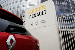 This photo taken on Thursday, Jan. 24, 2019 show a Ranult car parking outside the French carmaker headquarters in Boulogne-Billancourt, outside Paris, France. French carmaker Renault looks set to give its approval to Fiat Chrysler's merger offer. The company's board is meeting Tuesday afternoon at its headquarters to decide on a deal that could reshape the global auto industry.