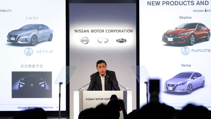 Nissan CEO Hiroto Saikawa speaks during a news conference at the global headquarters Thursday, July 25, 2019, in Yokohama, west of Tokyo. Nissan says it is slashing 12,500 jobs or about 9% of its global workforce in an effort to cut costs and achieve a turnaround, as its profits tumble.
