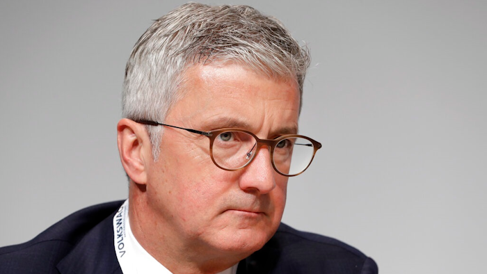 In this Thursday, May 3, 2018 file photo, Rupert Stadler, then CEO of Audi AG, attends the shareholders' meeting of the Volkswagen stock company in Berlin, Germany. German prosecutors announced Wednesday July 31, 2019, that they have charged Rupert Stadler and three other individuals with fraud in connection with sales of diesel cars with software that enabled cheating on emissions tests.