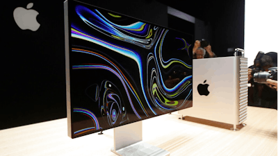 In this June 3, 2019, file photo a monitor of the Mac Pro is shown in the display room at the Apple Worldwide Developers Conference in San Jose, Calif. President Donald Trump is vowing to slap tariffs on Apple’s Mac Pros if the company shifts production of the computer from Texas to China. The pledge made in a Friday, Jul 26, tweet rebuffs Apple’s attempt to shield its products from taxes being imposed on goods made in China as part of Trump administration’s trade war with the world’s most populous country.