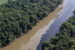 Bourbon mixes with water in the Kentucky River following a fire at a Jim Beam distillery in Woodford County, Kentucky.