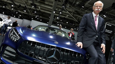 In this file photo, former Daimler CEO Dieter Zetsche poses prior to the annual shareholder meeting of the car manufacturer Daimler in Berlin, Germany.