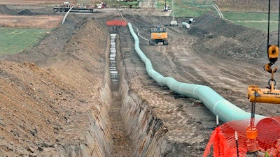 The company that built the Dakota Access Pipeline, shown here in October 2016 when construction was underway, is seeking state approval to build a new pumping station in Emmons County. Opponents of the Dakota Access oil pipeline plan to request a hearing on a proposal to nearly double the pipeline’s capacity.