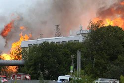 Black smoke and flames rise over a power station, in Mytishchi, outside Moscow, Russia.