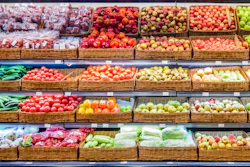 Fresh Fruits And Vegetables On Shelf In Market 908168476 4549x1985