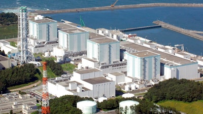 In this Aug. 10, 2006, file photo, the Fukushima Daini Nuclear Power Plant in Tomiokamachi, Fukushima Prefecture, is seen. The operator of the nuclear plant wrecked by a tsunami is considering decommissioning more reactors in northeastern Japan. Tokyo Electric Power Company Holdings says a decision is pending on dismantling the four reactors at the Fukushima Dai-ni plant.