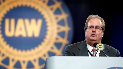 In this March 11, 2019 file photo, Gary Jones, president of the United Auto Workers union addresses delegates to the union's bargaining convention in Detroit. In recent years, Detroit automakers have been at relative peace with the UAW union because times have been good and profit-sharing checks have been fat. That all could change this week when talks open Monday, July 15 on new four-year contracts with the union representing 142,000 workers across the nation. Auto companies want to cut labor costs and end a gap with those at foreign-owned factories in the U.S. At bargaining convention in March, Jones told delegates that the union is raising strike pay and said the union would walk out if necessary.