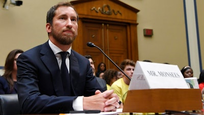 JUUL Labs co-founder and Chief Product Officer James Monsees testifies before a House Oversight and Government Reform subcommittee on Capitol Hill in Washington, Thursday, July 25, 2019, during a hearing on the youth nicotine epidemic.