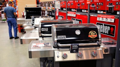 In this July 11, 2019, photo Weber grills are displayed at the Home Depot store in Londonderry, N.H. On Thursday, July 25, the Commerce Department releases its June report on durable goods.