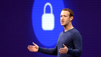 In this May 1, 2018, file photo, Facebook CEO Mark Zuckerberg delivers the keynote speech at F8, Facebook's developer conference, in San Jose, Calif. Federal regulators are fining Facebook $5 billion for privacy violations and instituting new oversight and restrictions on its business. But they are only holding Zuckerberg personally responsible in a limited fashion.