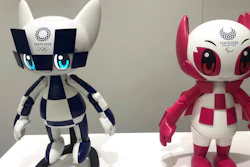 In this Thursday, July 18, 2019, photo, robots of mascots of Olympics 'Miraitowa,' left, and Paralympics 'Someity' are shown to the media at Toyota Motor Corp. headquarters in Tokyo. The mascot robots’ eyes change to the images of stars and hearts. The Japanese automaker Toyota, a major Olympic sponsor, is readying various robots for next year’s Tokyo Olympics.