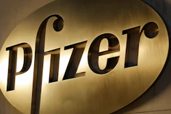 In this Nov. 23, 2015, file photo, the Pfizer logo is displayed at world headquarters in New York. Pfizer is buying Mylan in an all-stock deal and combining the generic pharmaceutical company with its off-patent branded and generic established medicines business.