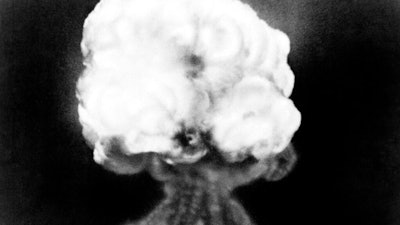 This July 16, 1945, file photo, shows the mushroom cloud of the first atomic explosion at Trinity Test Site near Alamagordo, N.M. A compensation program for those exposed to radiation from years of nuclear weapons testing and uranium mining would be expanded under legislation that seeks to address fallout across the western United States, Guam and the Northern Mariana Islands.